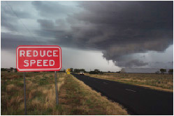 Rain clouds on a highway between Coober Pedy and Darwin. Rain clouds on a highway between Coober Pedy and Darwin.
