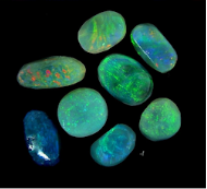 Natural black 'solid opal' rubs Natural black 'solid opal' rubs
